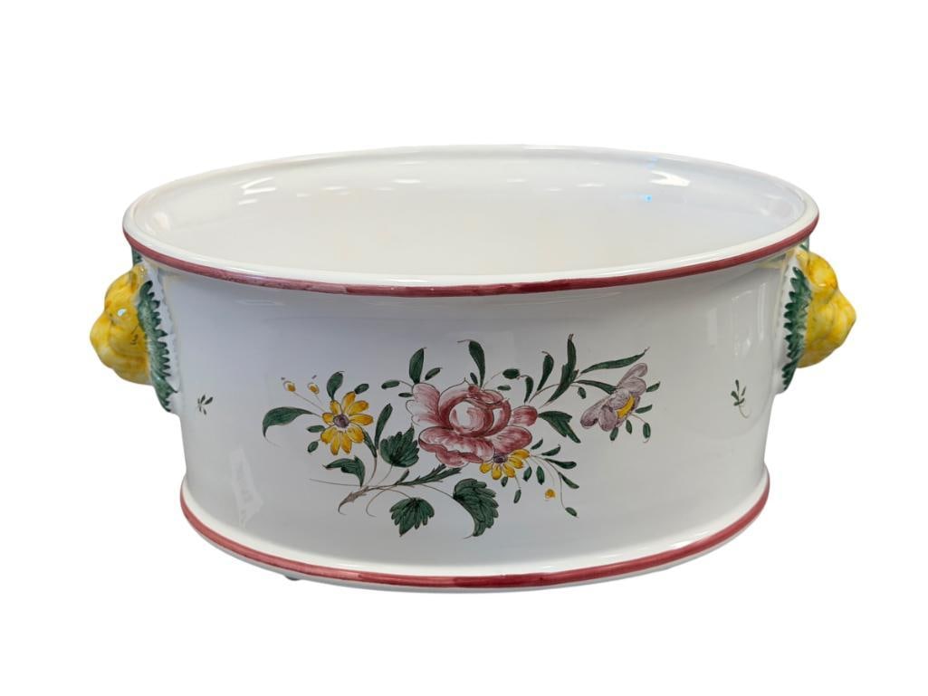FERET A MOUSTIERES FRENCH POTTERY FOOTED BOWL: OBLONG FOOTED BOWL WITH LION HEAD HANDLES AND HAND PAINTED FLORAL DESIGN, NO REPAIRS OR DAMAGE 10" L
