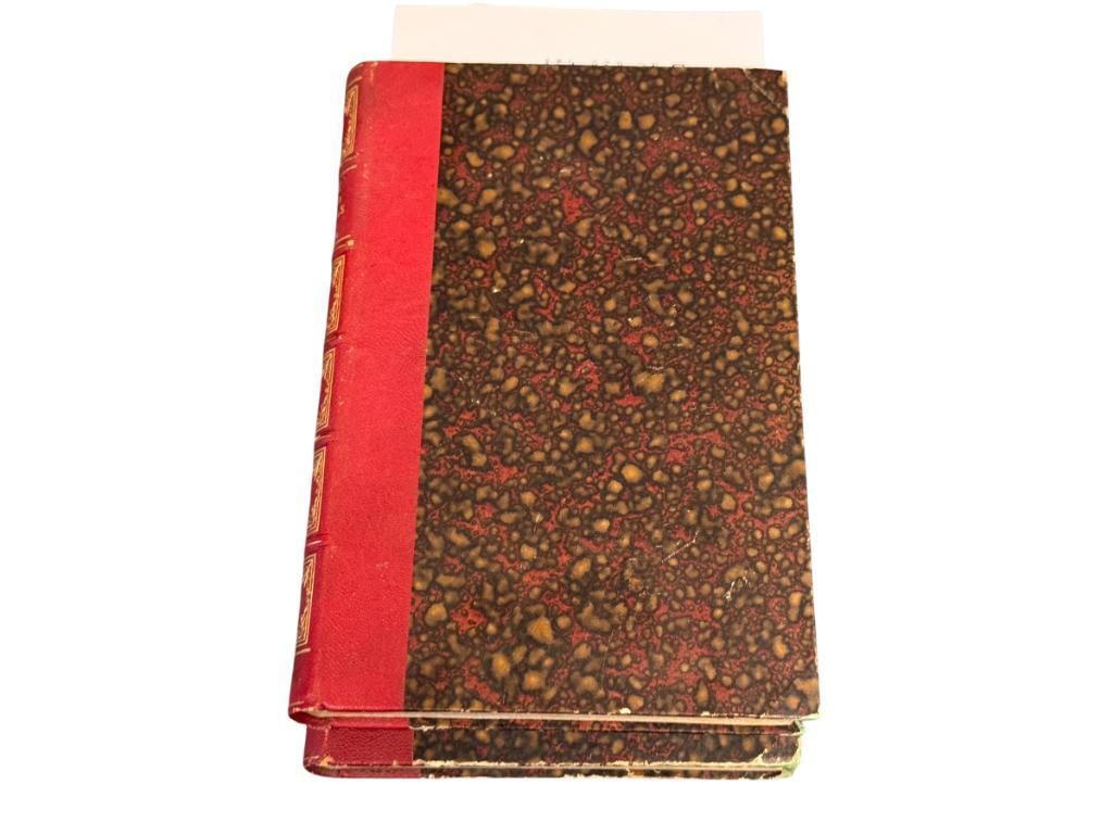 1867 VALS-LES-BAINES FRENCH STUDY OF MINERAL SPRINGS WRITTEN IN FRENCH TWO COPIES: HALF RED MOROCCO BOUND WITH GILT LETTERING ON THE SPINE, BOTH BOOKS SHOW WEAR TO EDGES, OVERALL IN GOOD CONDITION 6 1/2" X 9 1/2"