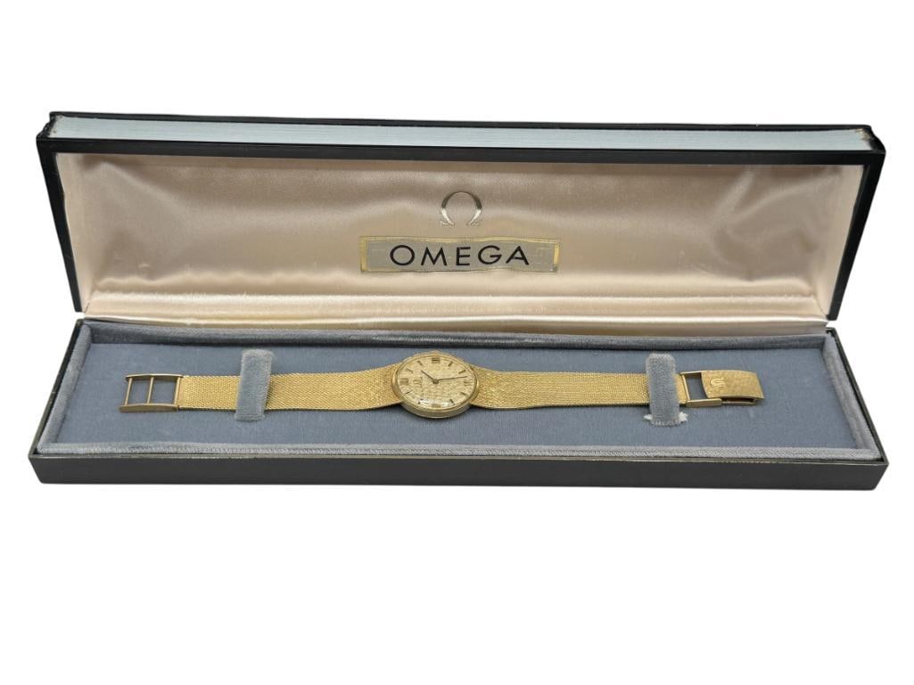 VINTAGE 14K YELLOW GOLD CASE AND BAND 1960'S-70'S OMEGA 620 17 JEWEL SUPERFLAT MOVEMENT WRISTWATCH: MANUAL WIND MECHANICAL MOVEMENT, INCLUDES ORIGINAL BOX, IN RUNNING CONDITION, OVERALL GOOD CONDITION, 14K YELLOW GOLD CASE AND BAND ALL MARKED OMEGA, SERIAL # 761498 MARKED ON INSIDE OF CASE 42.39