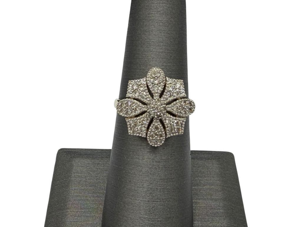 14K YELLOW GOLD DIAMOND FASHION RING FEATURING ROUND BRILLIANT CUT DIAMONDS: FEATURING A UNIQUE FLORAL LIKE DESIGN PAVED WITH 41 ROUND BRILLIANT CUT DIAMONDS, DESIGNER HALLMARKED SIZE 6, 3/4" FRONT, 3.19 GRAMS, 1MM DIAMONDS