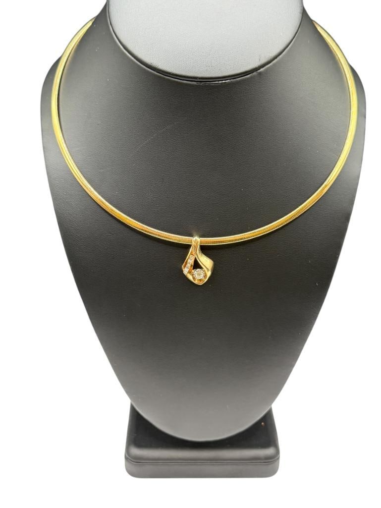 10K YELLOW GOLD ITALIAN OMEGA STYLE CHOKER NECKLACE WITH 14K YELLOW GOLD DIAMOND SLIDE PENDANT: PENDANT FEATURES A ROUND BRILLIANT CUT DIAMOND WITH DIAMOND CUT DESIGN AROUND BORDER ACCENTED BY BAGUETTE CUT DIAMONDS CHOKER LENGTH NECKLACE, .20CT ROUND DIAMOND, 3.24 GRAMS OF 14K, 9.24 GRAMS OF 10K