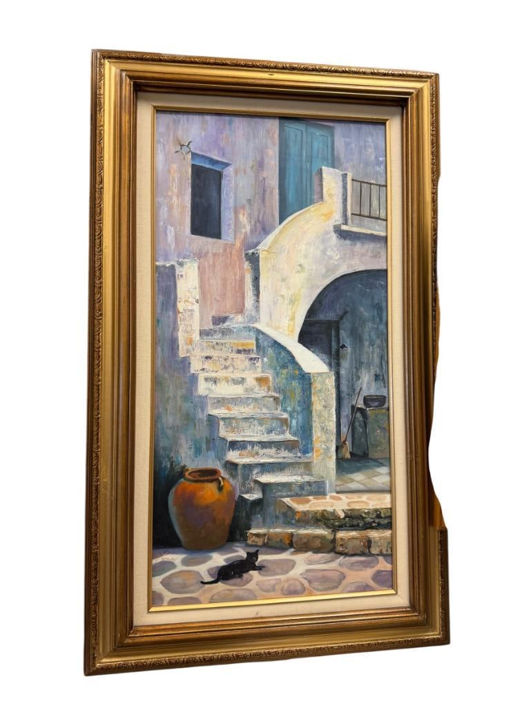 ORIGINAL OIL ON CANVAS PAINTING MEDITERRANEAN SCENE OF A COURTYARD SIGNED LONA: ART DEPICTS A BLACK CAT LAYING AT THE BOTTOM OF A STAIRCASE LEADING TO A DOOR, SIGNED LOWER LEFT, FRAMED WITH OVERHEAD LIGHT 22 1/2" X 37" FRAME