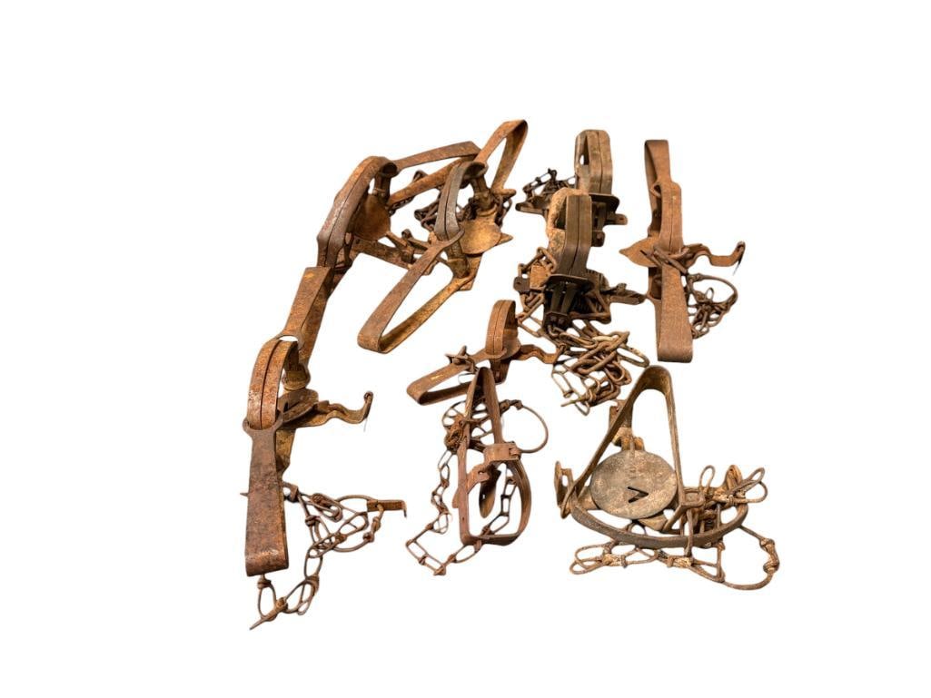 NINE ANTIQUE ANIMAL TRAPS INCLUDING ONEIDA VICTOR ANIMAL TRAPS: TWO DIFFERENT STYLE ANIMAL TRAPS IN VARIOUS SIZES, MOST ARE MARKED, FEW ARE DIFFICULT TO READ 6" UP TO 16" L