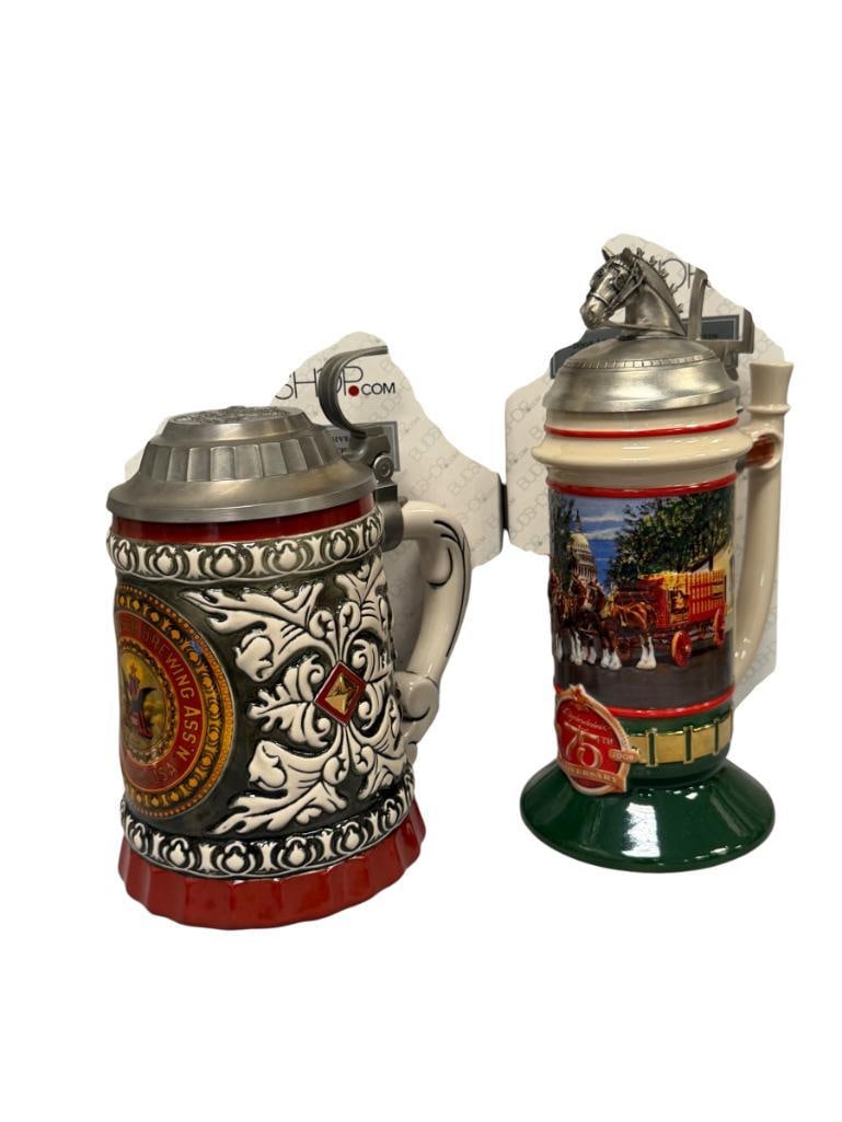 2008 AND 2009 ANHEAUSER-BUSCH MEMBER EXCLUSIVE STEINS BREWING ASSOC. AND 75TH ANNIVERSARY STEINS: EACH STEIN FEATURES RELIEF DESIGN WITH A AND EAGLE LOGO AND CLYDESDALES, IN MINT CONDITION WITH ORIGINAL BOXES 8 1/2" AND 10 1/2" H