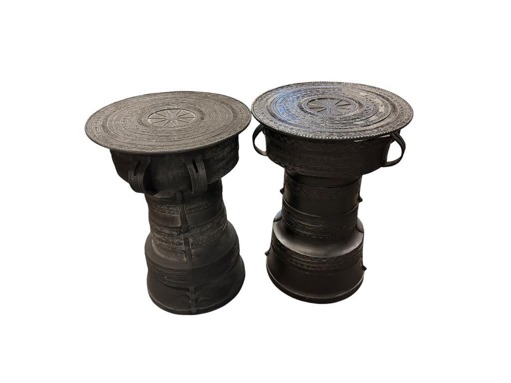PAIR OF POTTERY BARN SOUTHEAST ASIAN STYLE RAIN DRUM ACCENT TABLES OUTDOOR / INDOOR: FEATURES CIRCULAR INTRICATE PATTERNS / DESIGN, CAST ALUMINUM FINISHED IN BLACK 12" ROUND, 17" H
