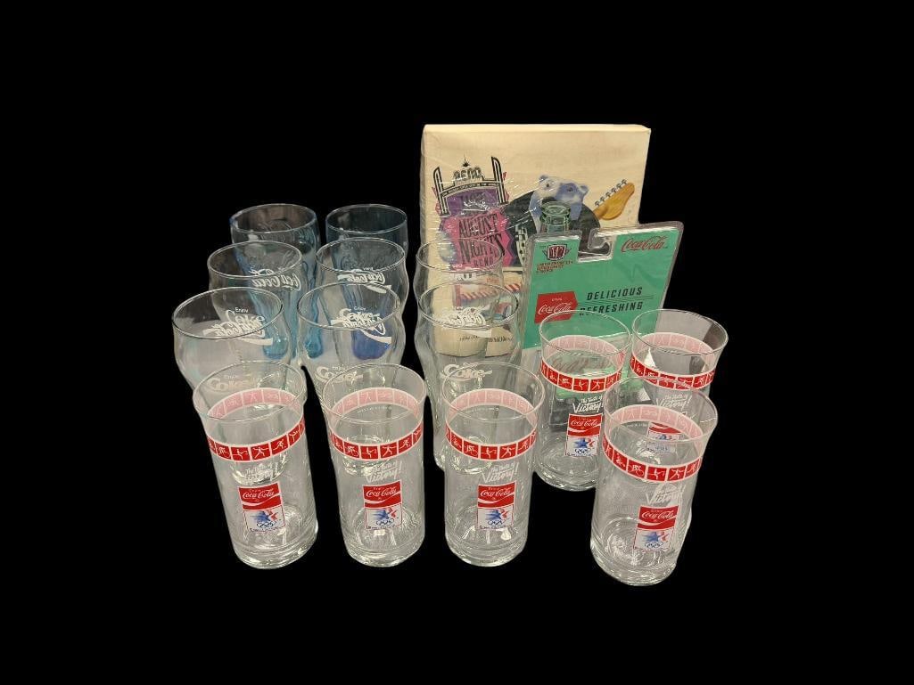COCA-COLA COLLECTIBLE GLASSES, M2 DIE-CAST CAR, AND HOT AUGUST NIGHTS COMMEMORATIVE BOTTLES: INCLUDES SET OF SIX LOS ANGELES OLYMPICS GLASSES, NEW M2 DIE-CAST 1/64 SCALE CAR, ETC. 5 1/2" AND 6" H GLASSES