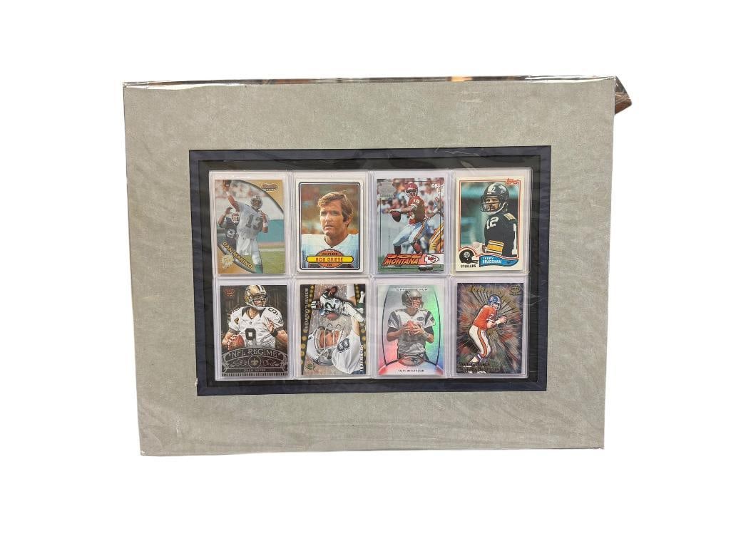 HALL OF FAMERS FOOTBALL CARDS BOB GRIESE, JOE MONTANA, TERRY BRADSHAW, JOHN ELWAY, TOM BRADY: DREW BREES, TROY AIKMAN, ALL IN PROTECTIVE SLEEVES, MATTED 20" X 16" 