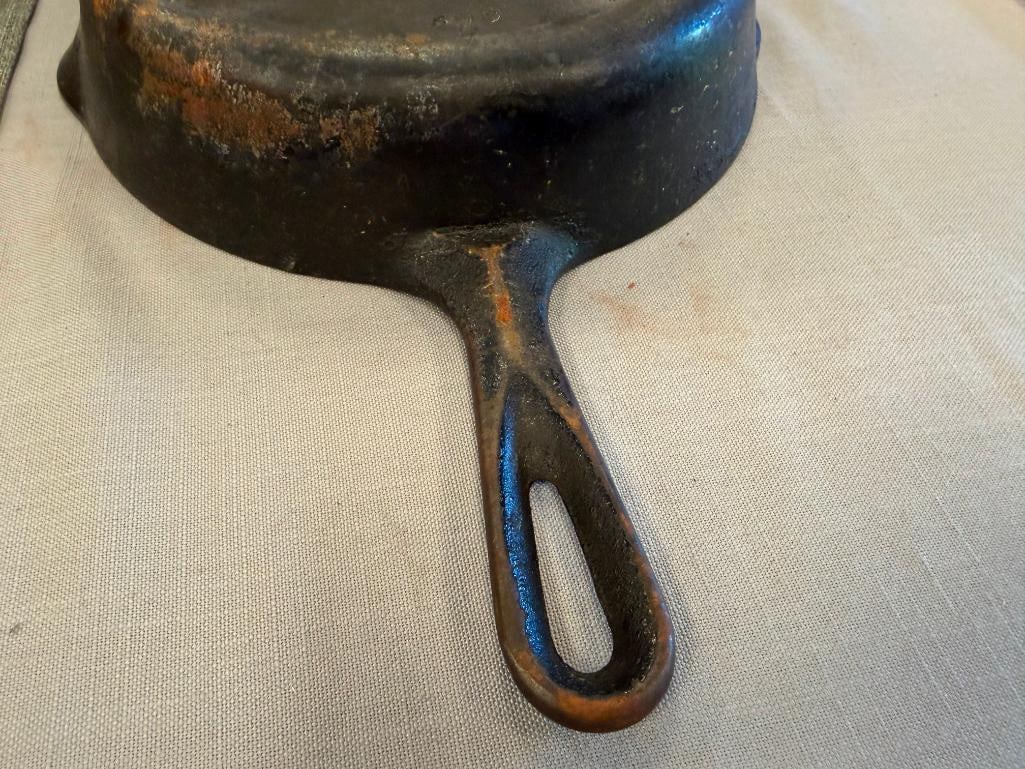 VINTAGE GRISWOLD 699 CAST IRON SKILLET PLUS THREE ADDITIONAL CAST IRON SKILETS - 6