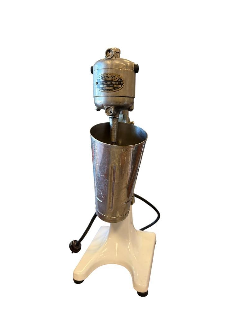 1920'S ARNOLD ELECTRIC CO. NO. 15 AUTOMATIC MIXER: WHITE ENAMELED BASE, INCLUDES STAINLESS STEEL CUP, NOT TESTED, POWER CORD IS BRITTLE 17 1/2" H