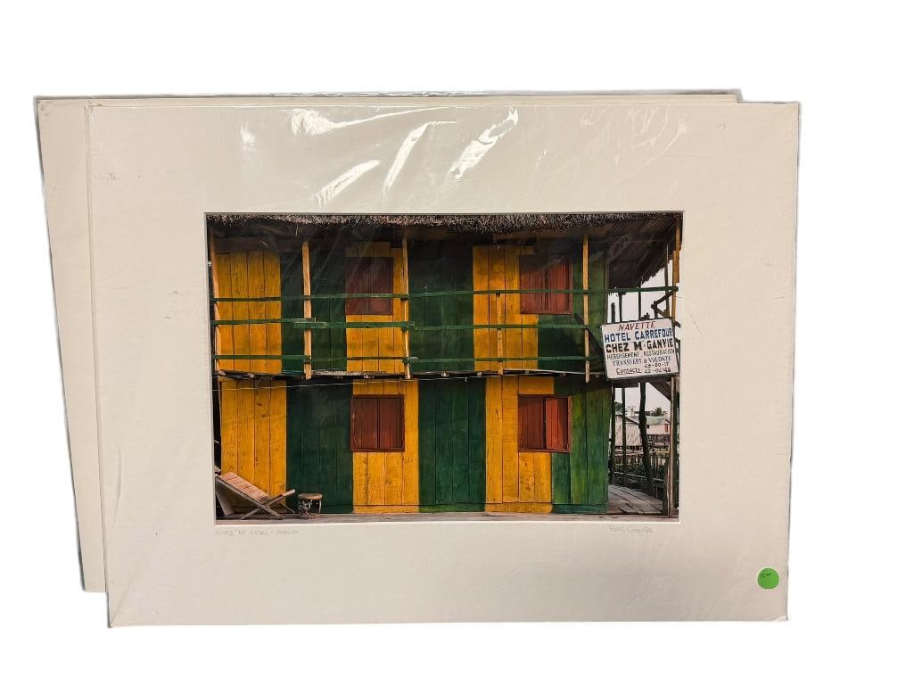 BILL COOPER SIGNED PHOTOGRAPH PRINT " CHEZ "M" HOTEL - GHANA ": SIGNED BY ARTIST ON MATTING, WILD ENCOUNTERS PHOTOGRAPHY, MATTED WITH PLASTIC WRAPPED, DEPICTS A FAMED GHANA, AFRICA HOTEL 24" X 18" MATTING