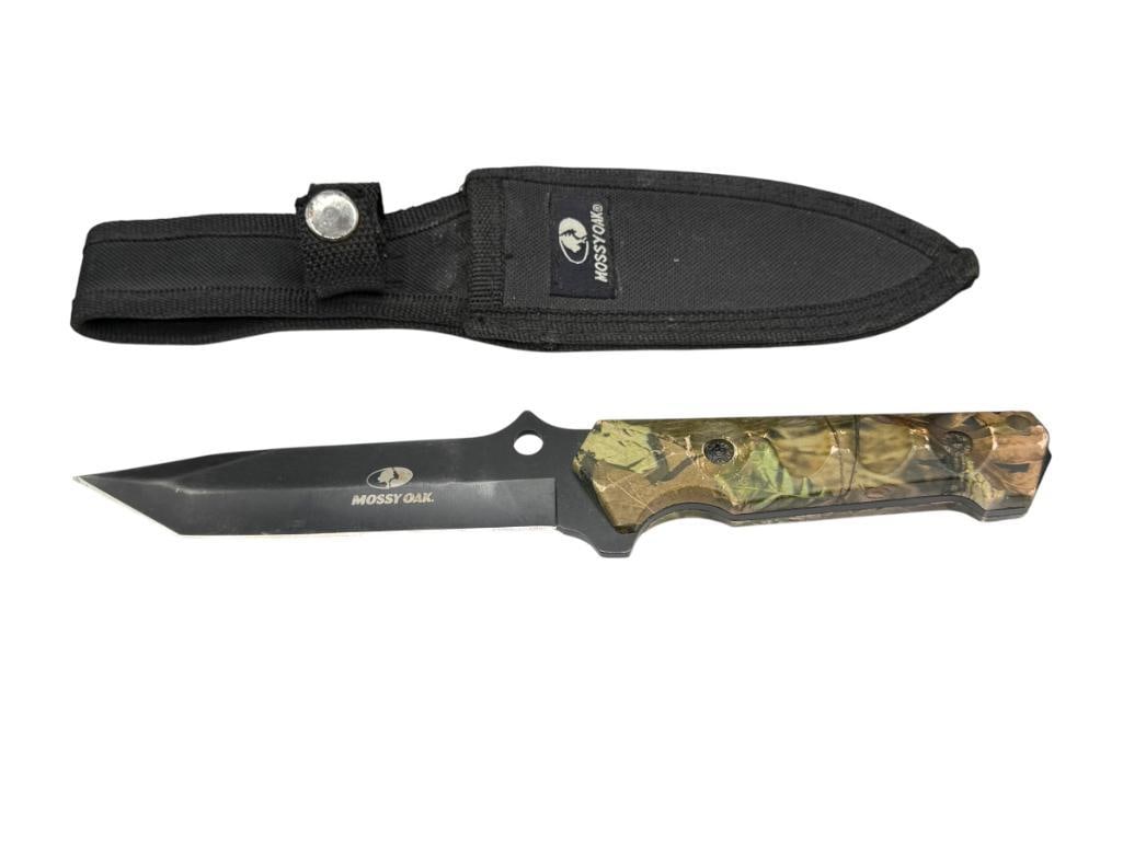 MOSSY OAK FIXED BLADE HUNTING KNIFE WITH TANTO STYLE BLADE: FEATURING SYNTHETIC CAMOUFLAGE HANDLE, BLACK FINISH ON BLADE, INCLUDES BLACK NYLON MOSSY OAK SHEATH, GLASS BREAK POINT AT TIP OF HANDLE 5" BLADE, 10 1/4" TOTAL LENGTH