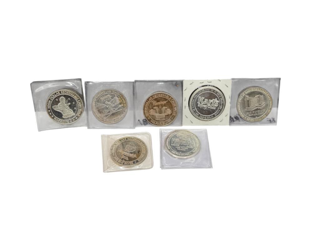 SIX RENO, NEVADA .999 FINE SILVER $7 CASINO GAMING TOKENS AND ONE $1 GAMING TOKEN: CASINOS INCLUDE HARRAH'S, FITZGERALDS, HARVEY'S, AND KARL'S SILVER CLUB APPROX. 20 GRAMS EACH