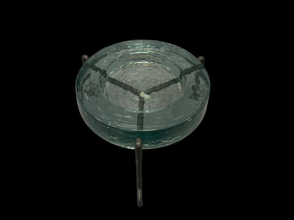 LARGE THICK GLASS VOTIVE HOLDER WITH BENT METAL STAND: SCROLLED SPIKE END FEET, GLASS MADE IN MEXICO 8 3/4" ROUND, 1 7/8" THICK