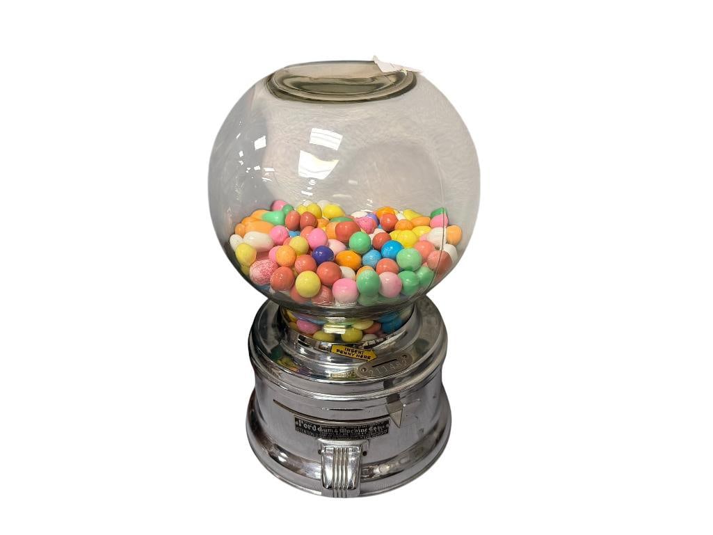 1920'S FORD GUM & MACHINE CO. CHROME FINISH PENNY BUBBLE GUM DISPENSER WITH GLASS JAR NO. 211482: ROUND STEPPED CHROME BASE WITH ORIGINAL LABEL 11" H