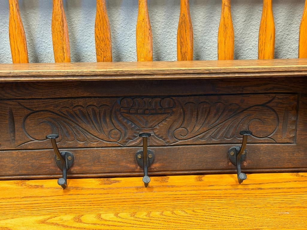 20TH CENTURY CARVED OAK HAT / COAT RACK WITH BRASS RINGS AND CAST IRON HOOKS - 2