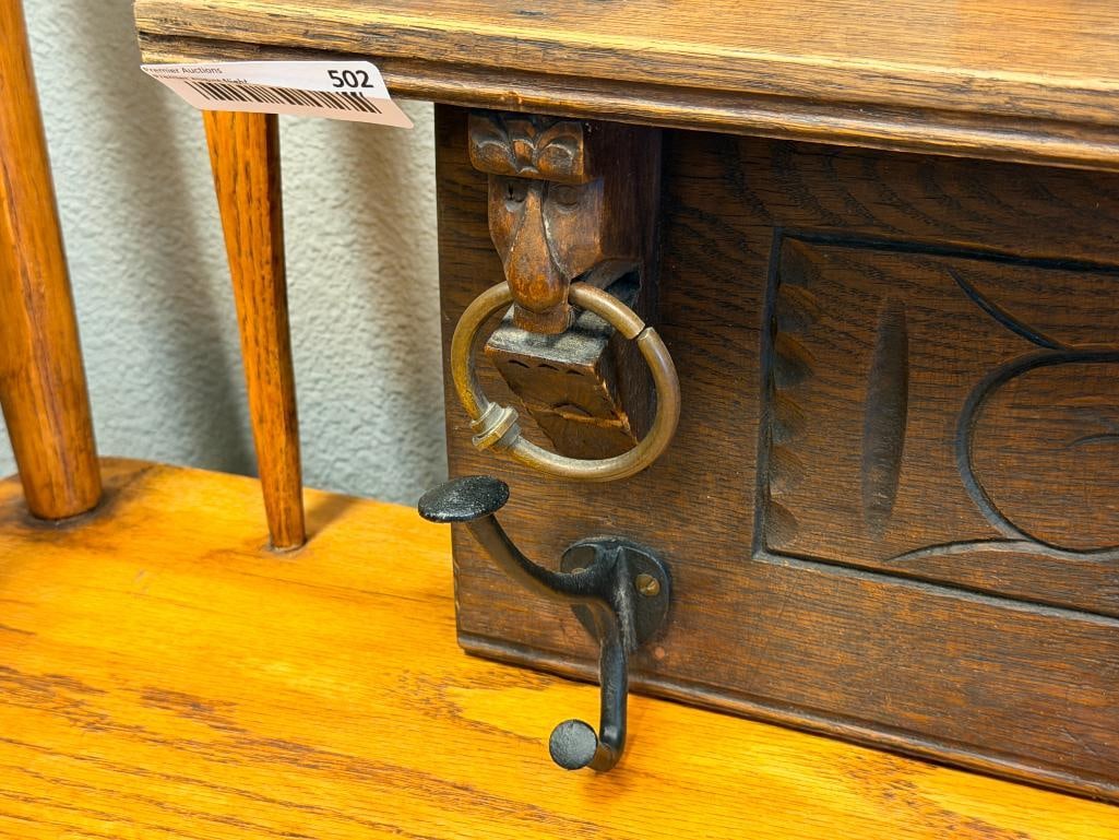 20TH CENTURY CARVED OAK HAT / COAT RACK WITH BRASS RINGS AND CAST IRON HOOKS - 3