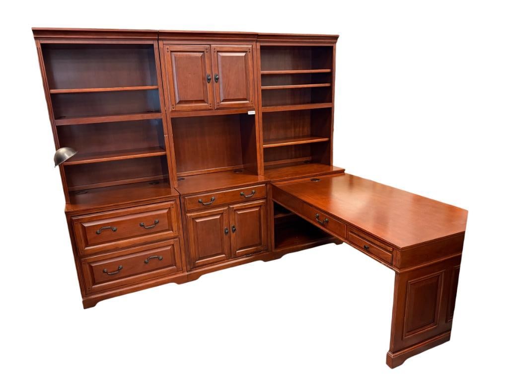 GOLDEN OAK L-SHAPE DESK WITH HUTCH IN CHERRY FINISH: SEVEN-PIECE DESK UNIT WITH BOOKCASE / HUTCH TOPS, KEYBOARD SLIDE-OUT, WRITING PAD PULLOUT, OIL RUBBED BRONZE HARDWARE, ADJUSTABLE SHELVES, IN GOOD CONDITION WITH LITTLE WEAR 97" X 83" X 32"
