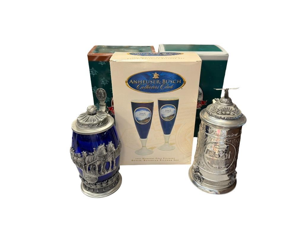 COLLECTIBLE ANHEUSER-BUSCH BUDWEISER BEER STEINS AND 2007 MEMBERS ONLY BUSCH BAVARIAN PILSNER SET: STEINS INCLUDE 2004 MEMBERS ONLY STEIN WORLD FAMOUS CLYDESDALES FEATURING COBALT BLUE GLASS AND 2001 BUDWEISER 125TH ANNIVERSARY STEIN FEATURING ALL PEWTER DESIGN, ALL INCLUDE ORIGINAL BOXES, PILSNER