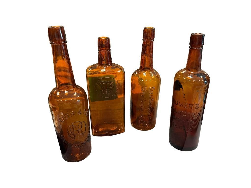 FOUR ANTIQUE AMBER WHISKEY AND BRANDY BOTTLES OF SAN FRANCISCO INCLUDING LOUIS TAUSSIG AND ROTH &... (1 of 18)