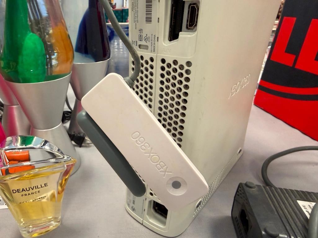 XBOX 360 GAME CONSOLE INCLUDES POWER CORDS, AV CORD, AND TWO CONTROLLERS - 11