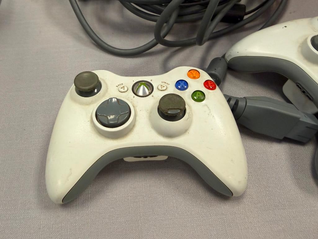 XBOX 360 GAME CONSOLE INCLUDES POWER CORDS, AV CORD, AND TWO CONTROLLERS - 3