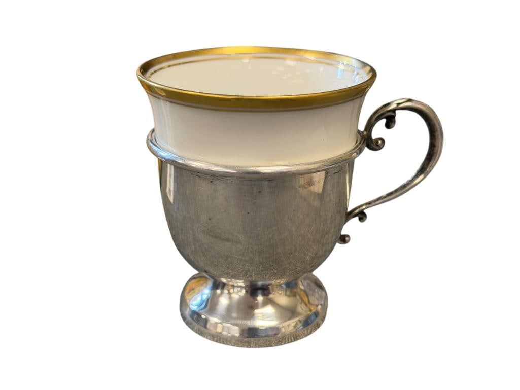 HUTSCHENREUTHER CHINA GERMAN BAVARIA CUP WITH STERLING SILVER HANDLE MADE IN U.S. ZONE 26 GRAMS: GILT RIM WITH THIN GILT BAND, TOTAL SILVER WEIGHT 26 GRAMS 2 3/4" H