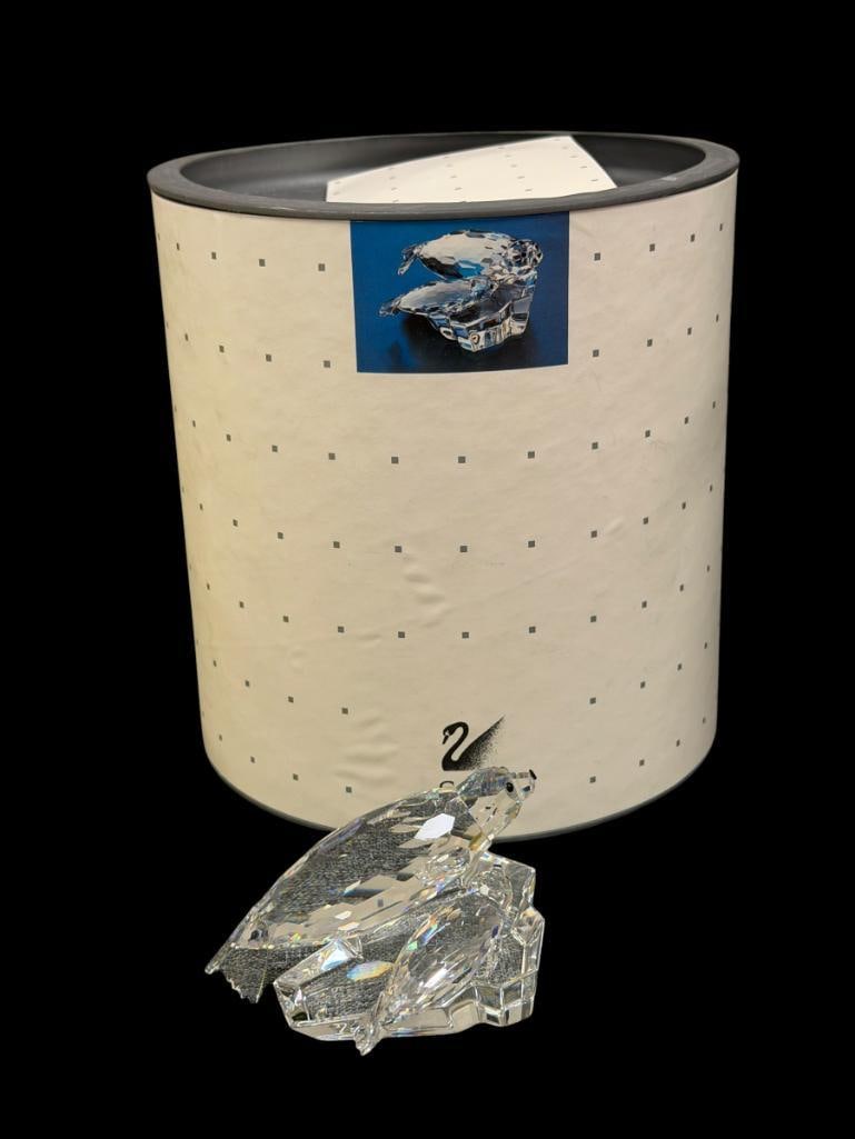 SWAROVSKI CRYSTAL SCS ANNUAL FIGURINE SAVE ME THE SEALS 1991 DESIGNED BY MICHAEL STAMY: WATERMARK ON THE BOTTOM, IN MINT CONDITION, INCLUDES ORIGINAL STORAGE TUBE AND CERTIFICATE BOOK, NO DAMAGE OR REPAIRS 4" L