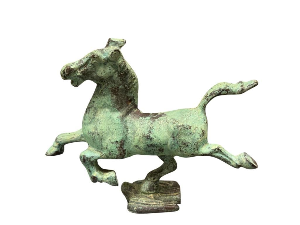 VINTAGE CAST METAL FLYING HORSE OF GANSU ICONIC CHINESE HAN DYNASTY SCULPTURE: DEPICTS A GALLOPING HORSE BALANCING ON A SWALLOW IN GREEN PATINA 5 1/2" H