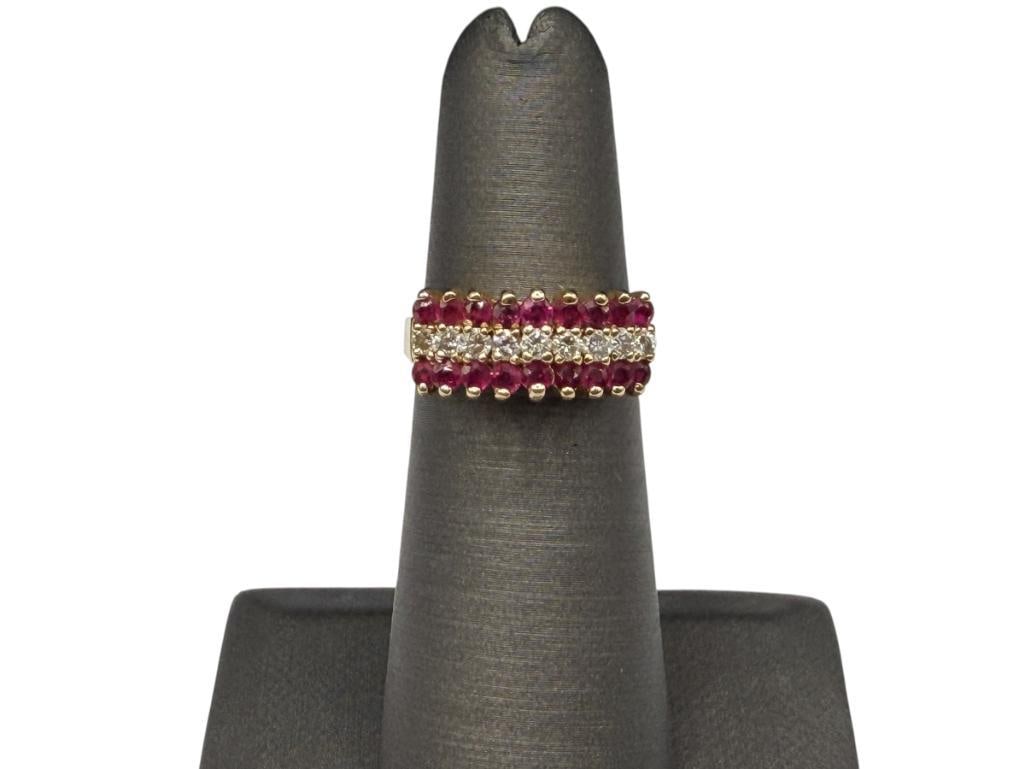 TRIBUTE DESIGN SIGNED 14K YELLOW GOLD RUBY AND DIAMOND TAPERED RING FEATURING ROUND CUT GEMS: INCLUDES NINE ROUND BRILLIANT CUT DIAMONDS IN CENTER OF TWO ROWS CONSISTING OF 18 RUBIES, HALLMARKED "TRIBUTE" SIZE 4 3/4, 5/16" FRONT, APPROX. .50CTTW RUBIES, .25CTTW DIAMONDS, 3.79 GRAMS