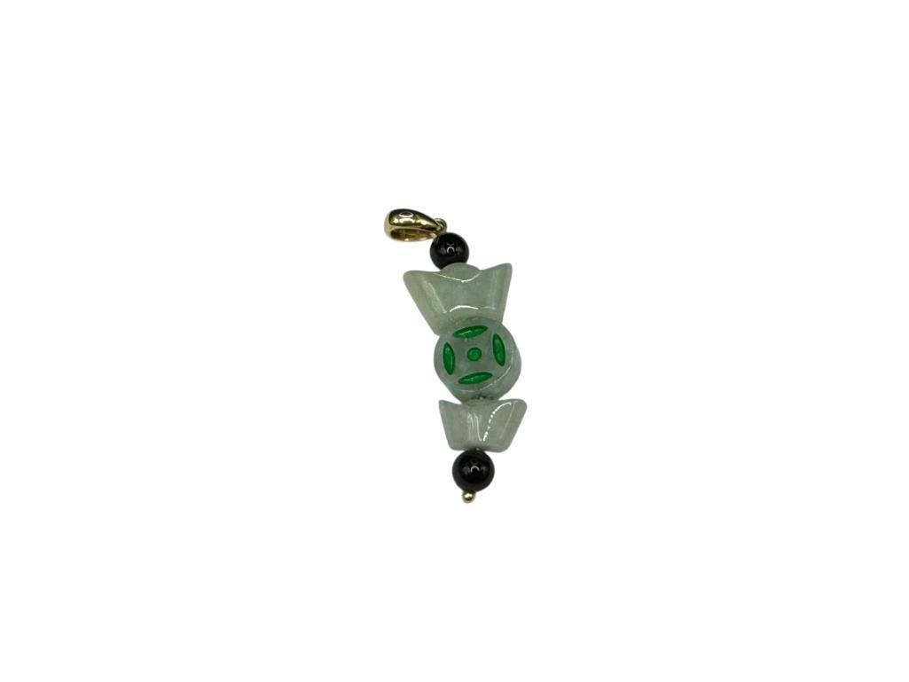 14K YELLOW GOLD CHINESE HALLMARKED GREEN JADE AND BLACK ONYX PENDANT: UNIQUE DESIGN FEATURING CARVED JADE AND ONYX, MARKED "CHINA" ON CLASP 1 3/4" 