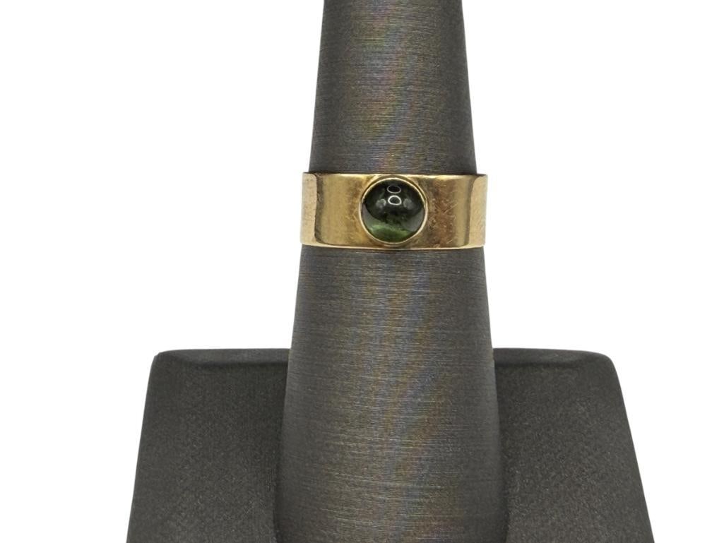 14K YELLOW GOLD ROUND CABOCHON GREEN TOURMALINE BAND: FEATURING SMOOTH FINISH ON BAND SIZE 6 3/4, 1/4" THICK, 2.48 GRAMS, 5MM TOURMALINE