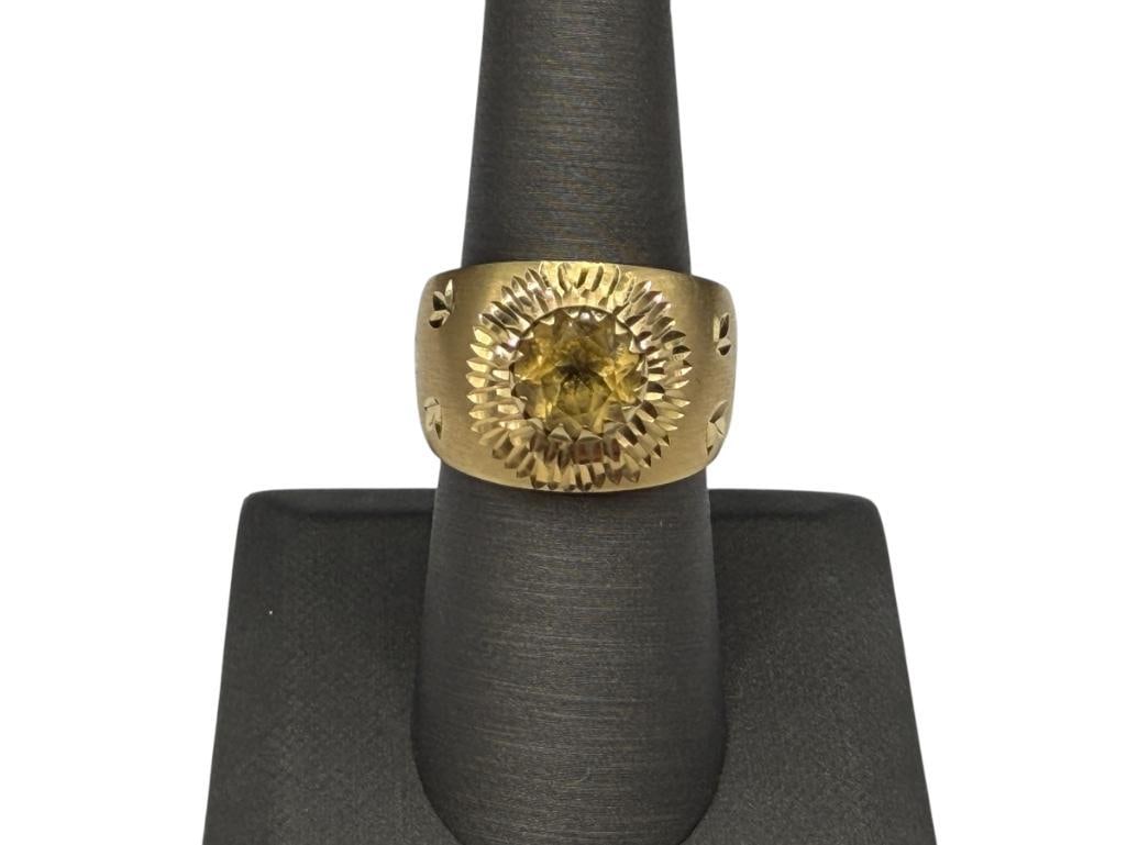 ITALIAN MILOR 14K YELLOW GOLD ROUND CUT CITRINE SUNFLOWER RING: FEATURING UNIQUE ENGRAVED METAL DESIGN AROUND CITRINE TO GIVE THE APPEARANCE OF A SUNFLOWER, HALLMARKED "ITALY MILOR" SIZE 7 1/2, 5/8" FRONT, 3.95 GRAMS, 2.00CT CITRINE