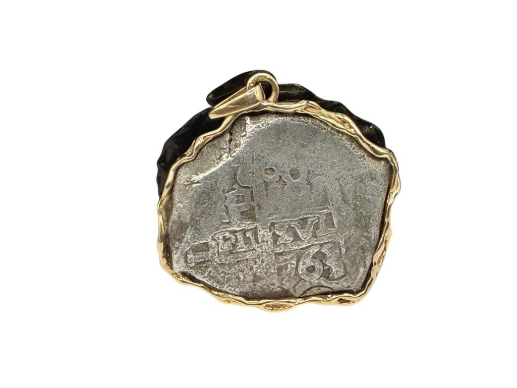 14K YELLOW GOLD PENDANT BEZEL WITH ENCASED ANCIENT SILVER COIN: SHIPWRECK COIN 1 5/8", 31.32 GRAMS