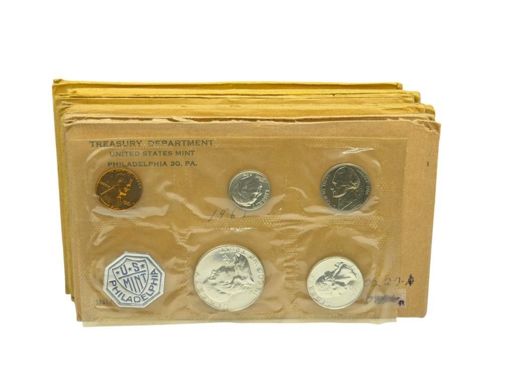 EIGHT U.S. MINT PROOF SETS INCLUDING TWO 1961, TWO 1962, TWO 1963, AND TWO 1964: EACH SET INCLUDES ORIGINAL ENVELOPE AND THREE 90% SILVER COINS INCLUDING A HALF DOLLAR, QUARTER, AND DIME