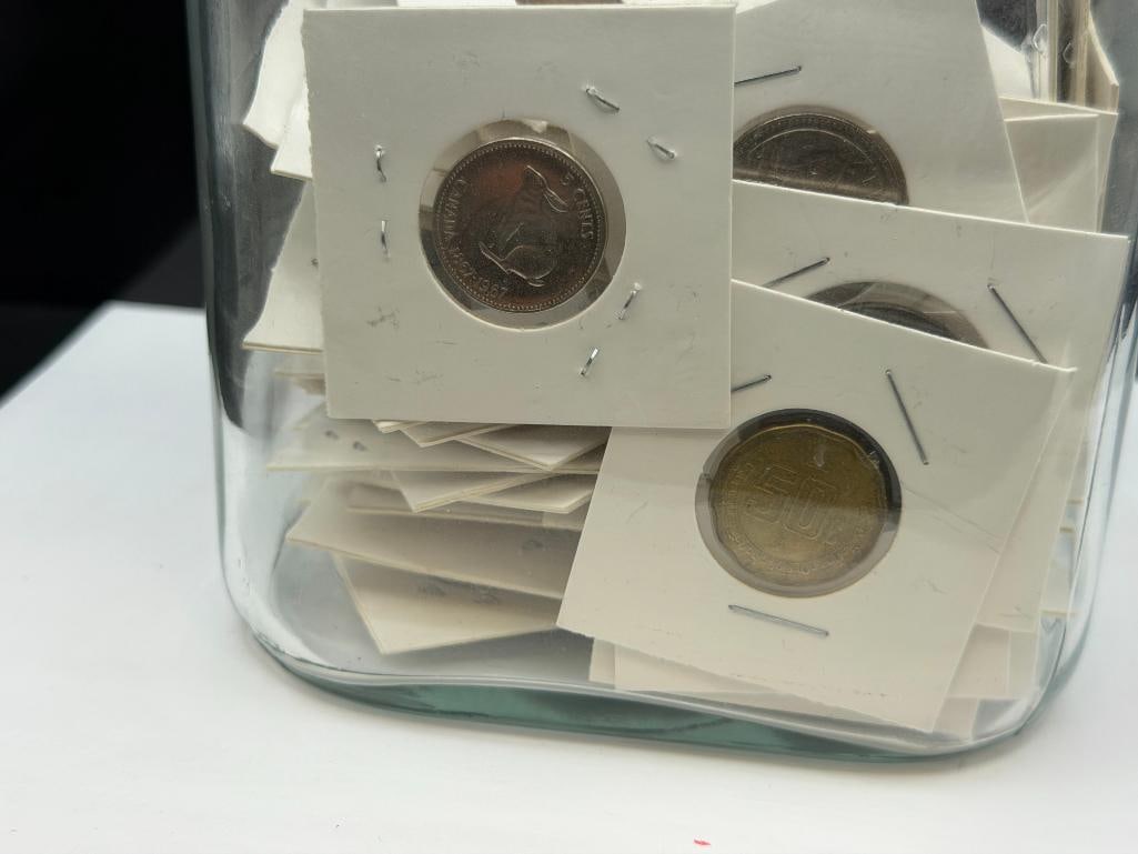 GLASS JAR FILLED WITH FOREIGN COINS FROM ALL OVER THE WORLD - 2