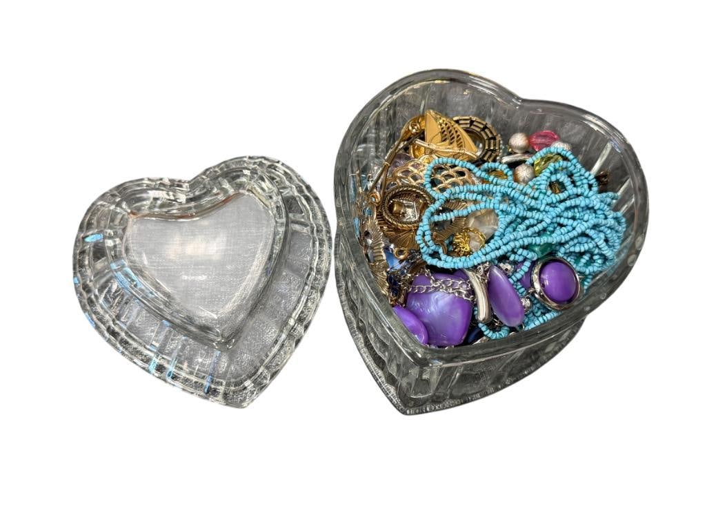 HEART SHAPED CRYSTAL JAR FILLED WITH WOMAN'S FASHION JEWELRY: INCLUDES NECKLACES, EARRINGS, PARTS AND PIECES, SOME WEARABLE 6" JAR