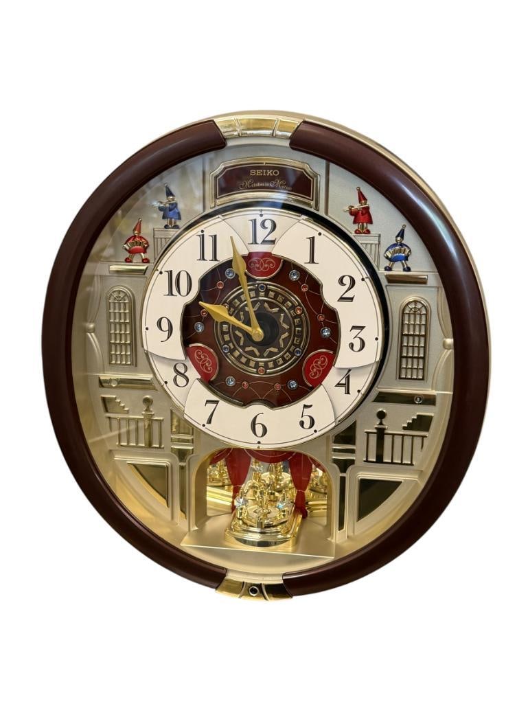 SEIKO MELODIES IN MOTION SPECIAL COLLECTORS EDITION ANIMATED WALL CLOCK 2015 QXM554BRH: DARK WOOD FINISH WITH SILVER AND GOLD TONE SILHOUETTE BACK, TESTED + 15 1/2" X 17"