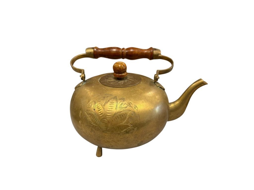 VINTAGE HAND CHASED BRASS TEAPOT MADE IN INDIA: ROUND TEAPOT WITH TAPERED FEET AND SWING HANDLE WITH WOOD GRIP, MARKED INDIA 951 ON THE BOTTOM 7 3/4" ROUND