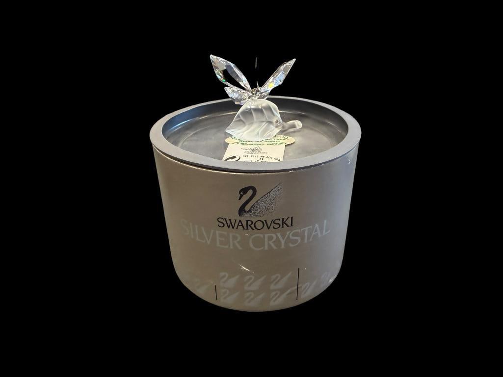 SWAROVSKI CRYSTAL FIGURINE BUTTERFLY ON LEAF IN THE SECRET GARDEN COLLECTION INTRODUCED IN 1994: RETIRED IN 2011DESIGNED BY CLAUDIA SCHNEIDERBAUER, NO. 7615NR0003, IN MINT CONDITION, INCLUDES ORIGINAL STORAGE TUBE, MISSING CERTIFICATE BOOKLET, NO CHIPS OR REPAIRS 2 1/4" WINGSPAN
