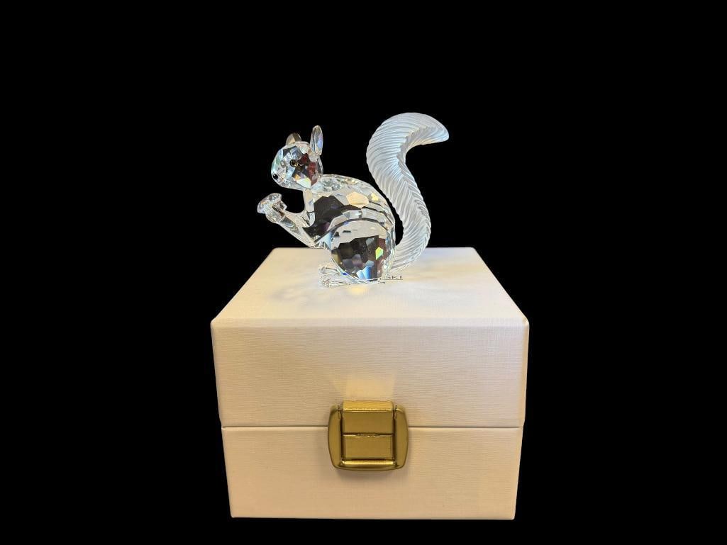 SWAROVSKI CRYSTAL SCS 10TH ANNIVERSARY SQUIRREL FIGURINE RELEASED IN 1997 DESIGNED BY A. HIRZINGER: RELEASED IN 1997 TO CELEBRATE THE 10TH ANNIVERSARY OF THE SWAROVSKI CRYSTAL SOCIETY, RETIRED, INCLUDES ORIGINAL BOX, IN MINT CONDITION, NO CHIPS OR REPAIRS 2 1/4" H