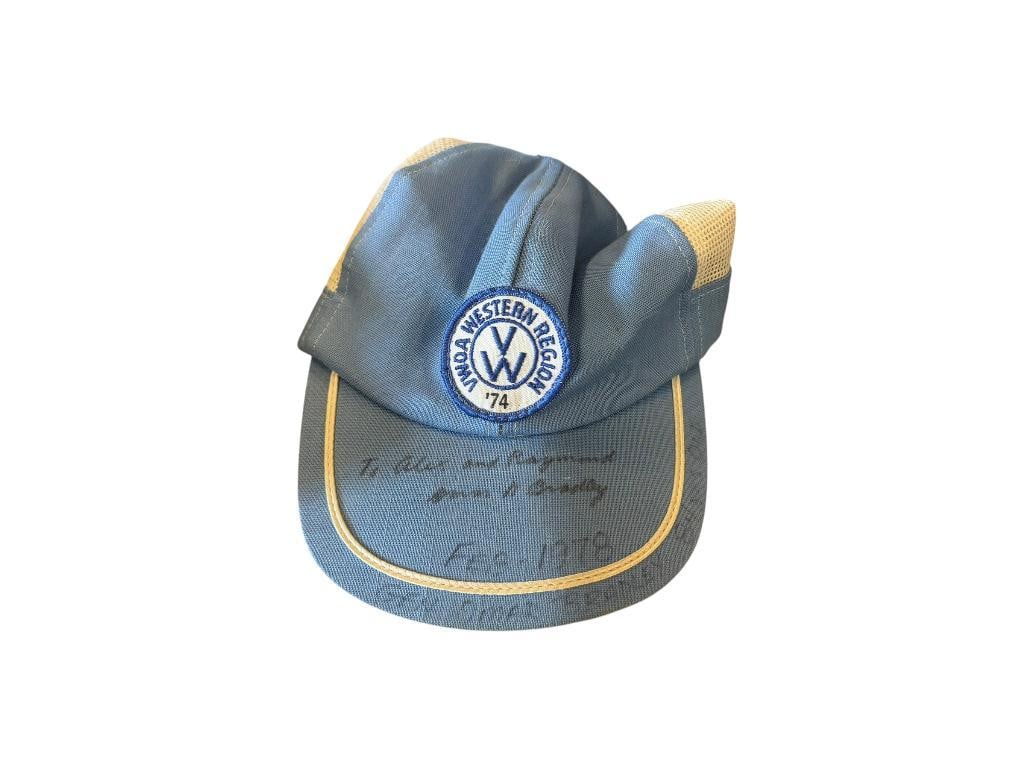 1970'S VOLKSWAGEN WESTERN REGION SIGNED CAP BY GENERAL OMAR NELSON BRADLEY: OMAR NELSON BRADLEY (1893-1981) WAS SENIOR OFFICER OF THE UNITED STATES ARMY, OVERSAW THE MILITARY'S DECISION MAKING DURING KOREAN WAR, SIGNED ON THE BRIM, PERSONALIZED