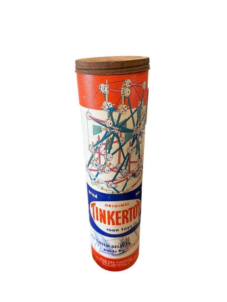 1950'S - 1960'S TINKERTOY NO. 146 CARDBOARD CANISTER WITH BUILDINGS PIECES: MADE BY THE TOY TINKERS DIV. OF SPALDING SALES CORP., TUBE IS NEAR FULL