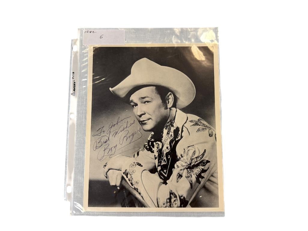 FAMOUS KING OF THE COWBOYS ROY ROGERS AUTOGRAPHED BLACK AND WHITE PHOTOGRAPH: FEATURES ROY ROGERS (1911-1998) LEGENDARY TELEVISION STAR IN ORNATE EMBROIDERED WESTERN SHIRT AND COWBOY HAT, PERSONALIZED, SIGNED LEFT EDGE 8" X 10"