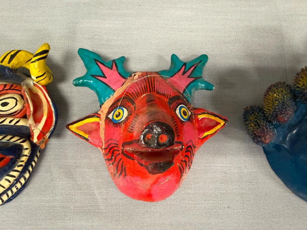 EIGHT MEXICAN FOLK ART TERRACOTA AND GOURD HAND CRAFTED MASKS INCLUDING SEVERAL DIABLO MASKS - 11