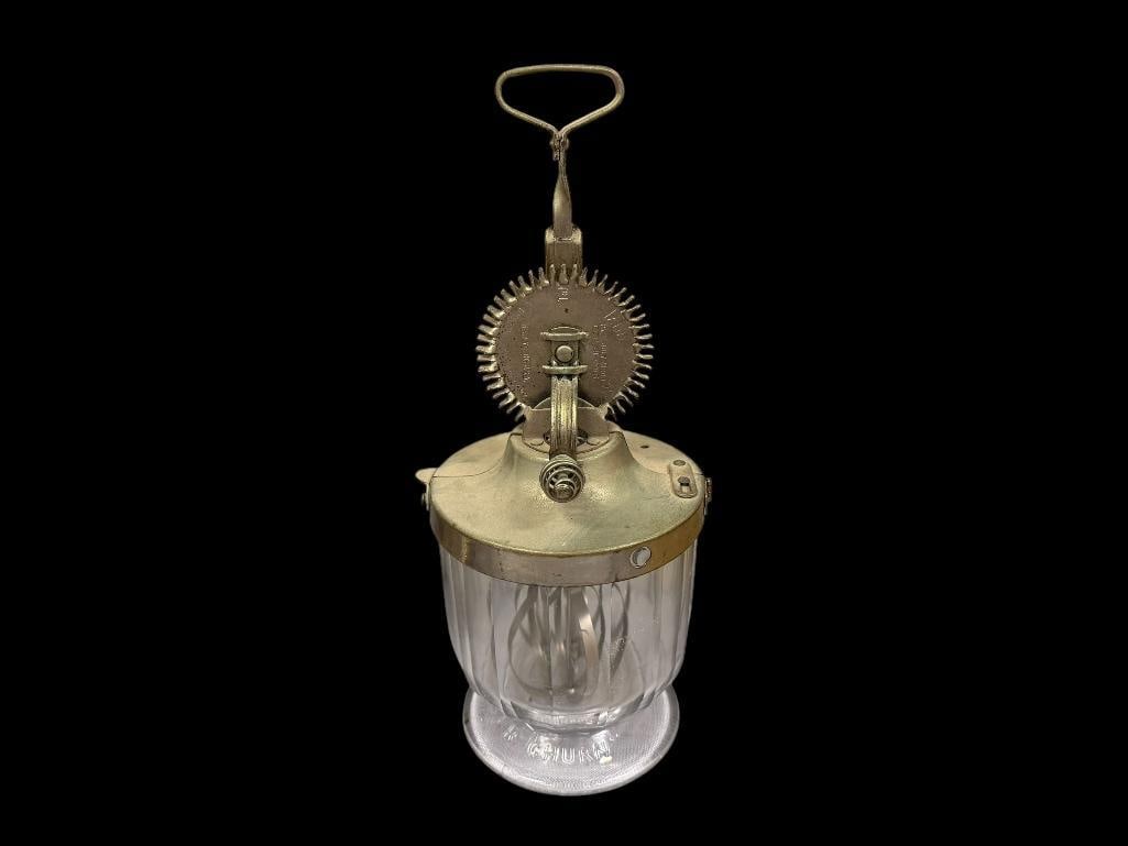 LADD BEATER LADD MIXER CHURN NO. 1 HAND CRANK EGG BEATER / KITCHEN MIXER: CIRCA EARLY 1920'S, GLASS FOOTED JAR WITH ATTACHED HAND CRANK BEATER, EMBOSSED LETTERING ON THE JAR, MADE IN NEW YORK, FUNCTIONAL 12 1/2" H