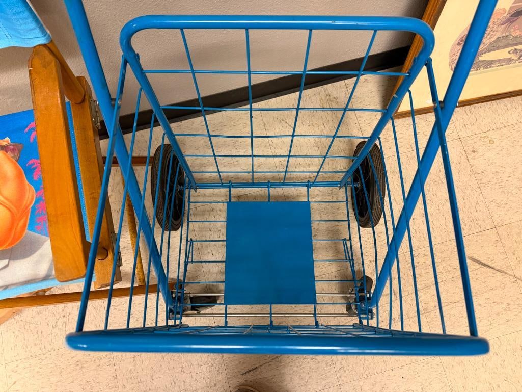 BLUE FOLDING METAL UTILITY CART FEATURING DEEP WIRE BASKET AND FRONT SWIVEL WHEELS - 4