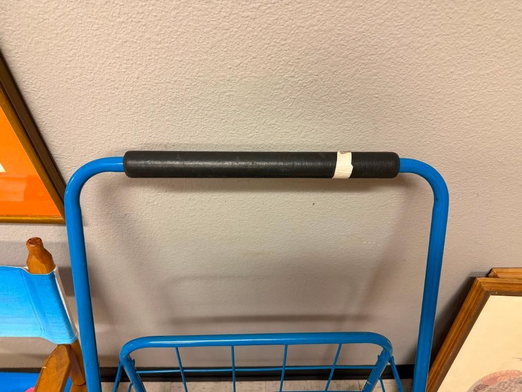 BLUE FOLDING METAL UTILITY CART FEATURING DEEP WIRE BASKET AND FRONT SWIVEL WHEELS - 7