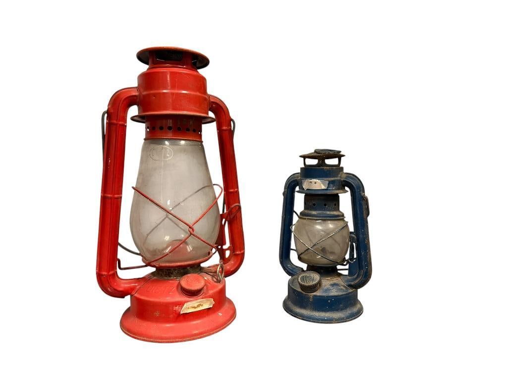 TWO VINTAGE KEROSENE OIL LANTERS INCLUDING RED DIETZ JUNIOR NO. 20 AND GUANG-ZHOU BLUE LANTERN: BOTH ARE IN FAIR CONDITION, DIETZ HAS MATCHING GLOBE LARGEST IS 12" H
