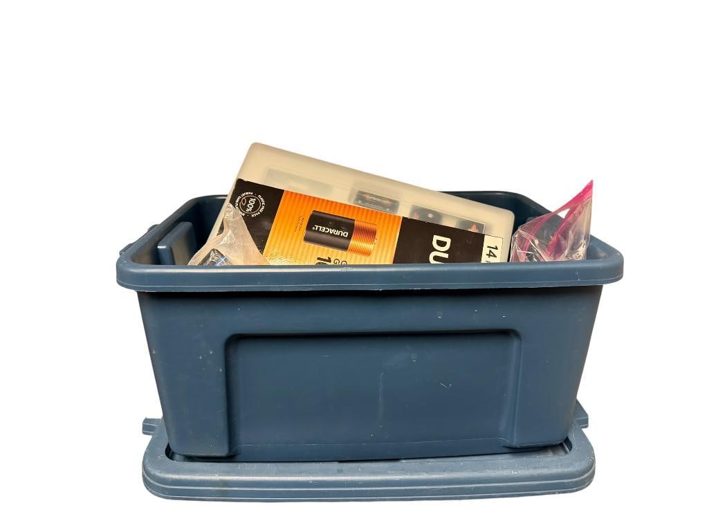 SMALL TUB FULL OF ASSORTED BATTERIES INCLUDING TWO DURACELL 14 PACK D BATTERIES: INCLUDES DOUBLE AA, BATTERY CHARGERS, AND MORE TUB IS 13" X 9" X 7"