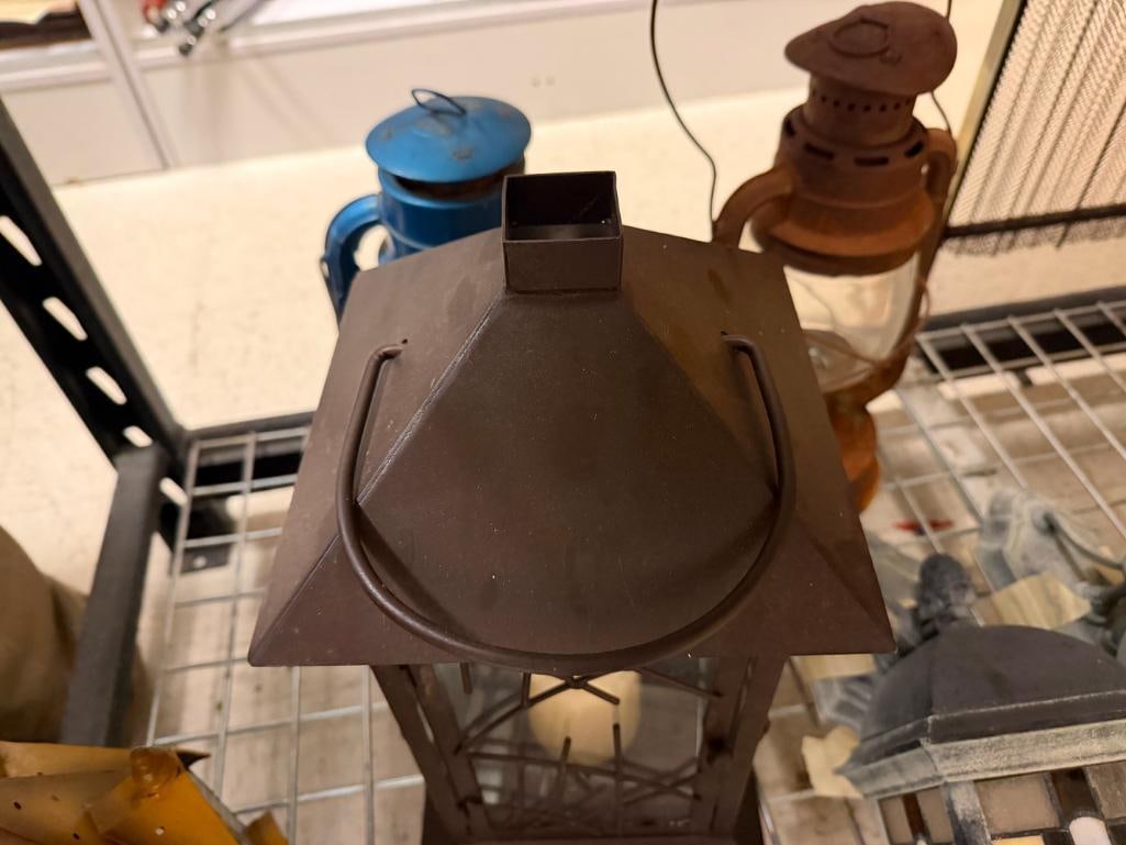 TWO METAL FIGURAL CANDLE LANTERNS AND ONE ELECTRIC OUTDOOR WALL LIGHT - 12